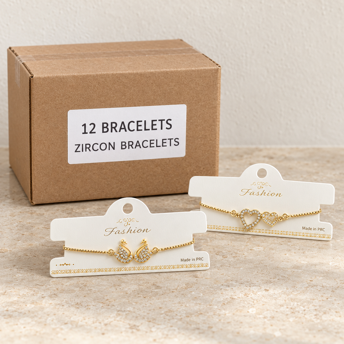 Bracelets — Box of 12 — 12 × Zircon Bracelets. Representative samples beside illustrative wholesale carton.