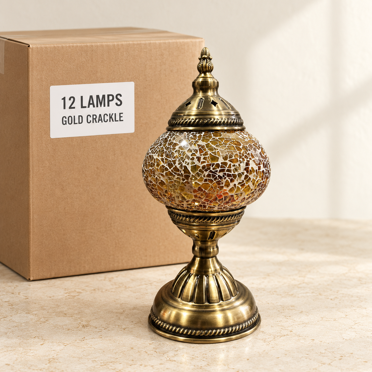 Gold Crackle mosaic table lamp, based on the original Bazaar G retail product photo. One sample shown; wholesale box contains 12 of this design. Carton illustration.