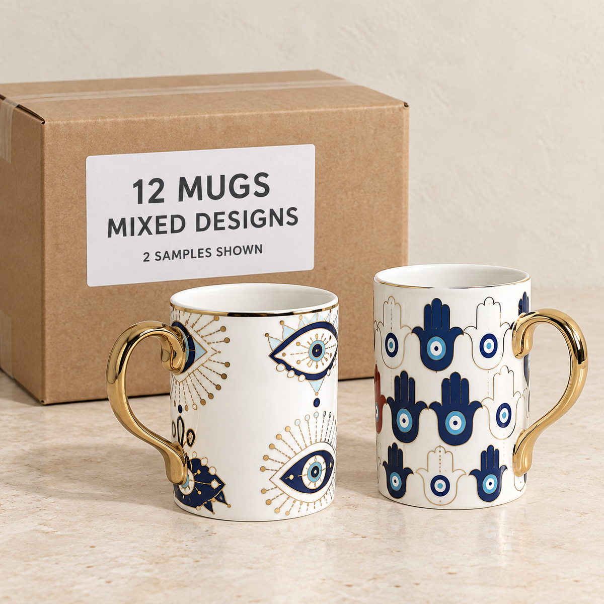 Evil Eye & Hamsa Mugs — Box of 12 — Mixed box — 4 of each design. Representative samples beside illustrative wholesale carton.