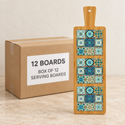 Turkish Tile Bamboo Serving Boards · 13 × 43 cm — Box of 12 — Box of 12 serving boards. Representative samples beside illustrative wholesale carton.