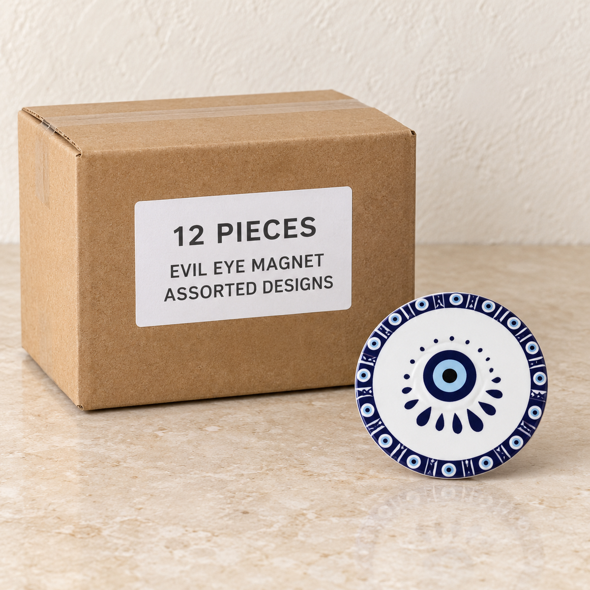 Evil Eye Magnet - Assorted Designs — Box of 12 — 12 × Evil Eye Magnet - Assorted Designs. Representative samples beside illustrative wholesale carton.