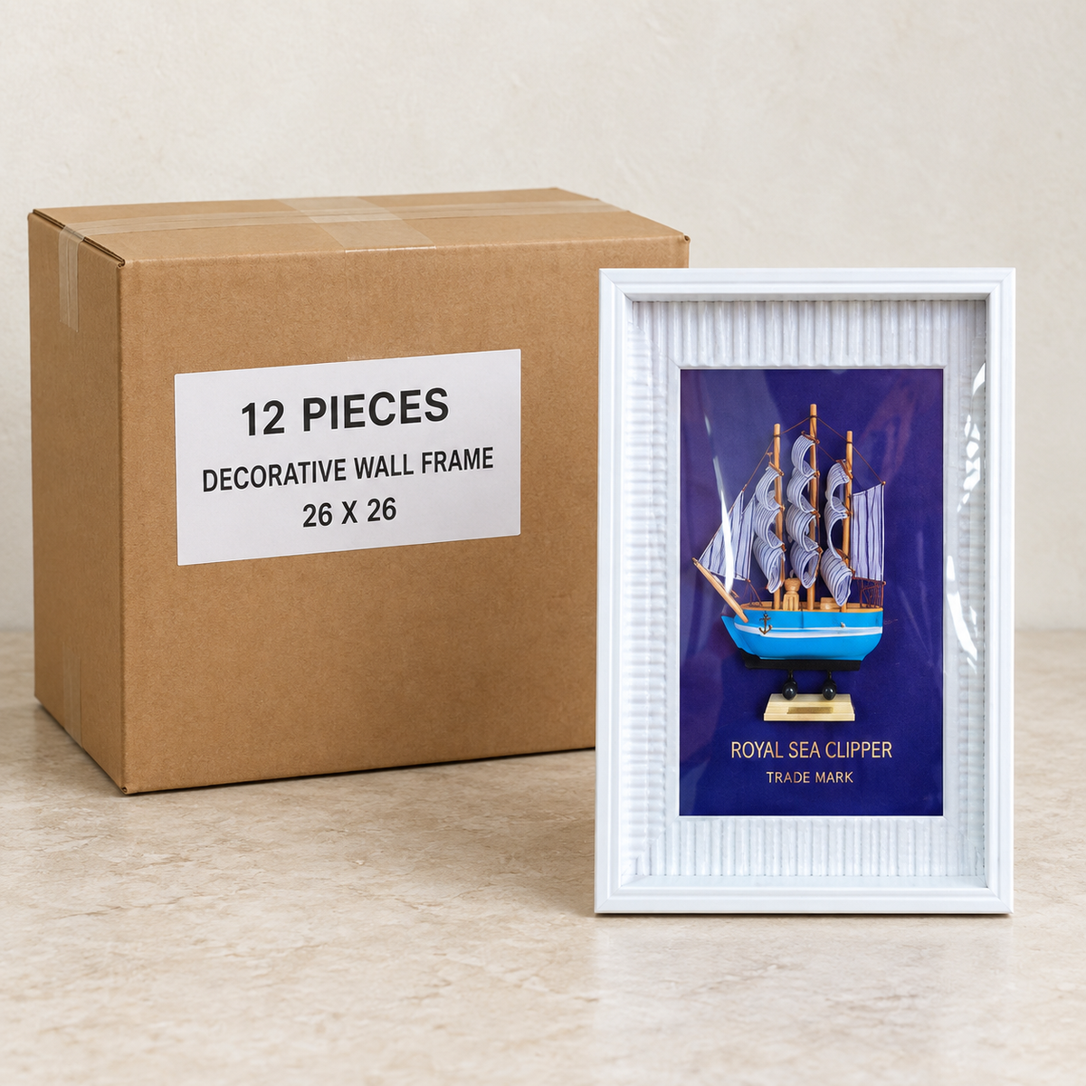 Decorative Wall Frame - 26 x 26 — Box of 12 — 12 × Decorative Wall Frame - 26 x 26. Representative samples beside illustrative wholesale carton.