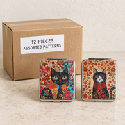 Decorative Compact Mirrors — Box of 12 — 12 × Assorted Patterns. Representative samples beside illustrative wholesale carton.