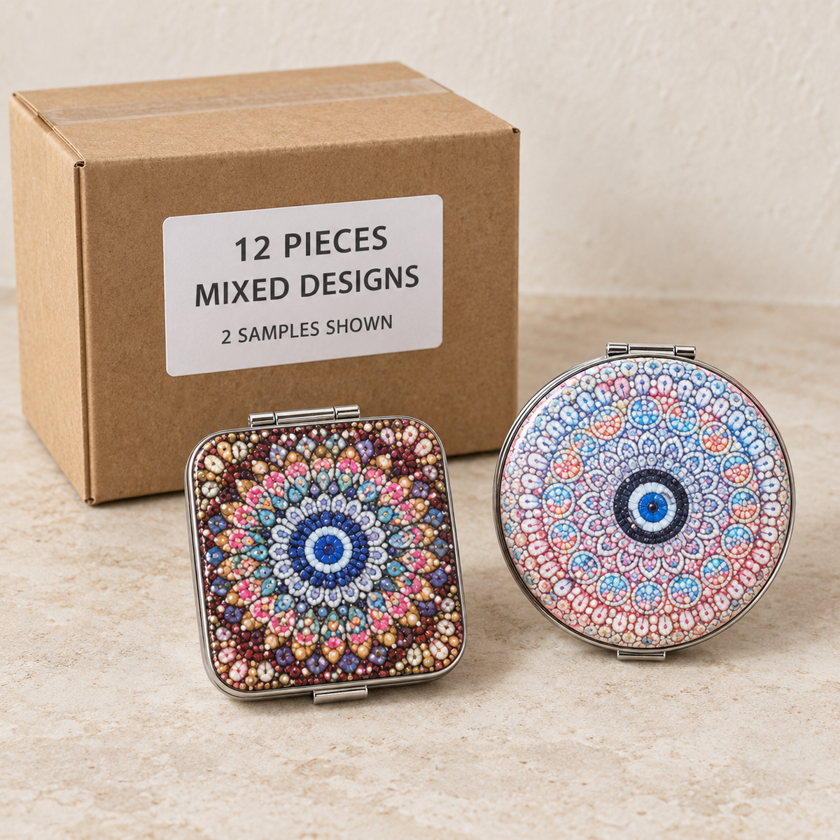 Decorative Compact Mirrors — Box of 12 — Mixed box — 4 of each design. Representative samples beside illustrative wholesale carton.