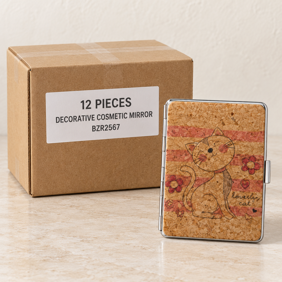 Decorative Cosmetic Mirrors — Box of 12 — 12 × Decorative Cosmetic Mirror - BZR2567. Representative samples beside illustrative wholesale carton.