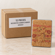 Decorative Cosmetic Mirrors — Box of 12 — 12 × Decorative Cosmetic Mirror - BZR2567. Representative samples beside illustrative wholesale carton.