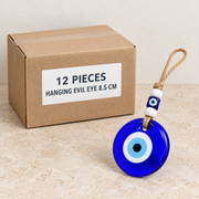 Hanging Evil Eyes — Box of 12 — 12 × Hanging Evil Eye - 8.5 cm. Representative samples beside illustrative wholesale carton.