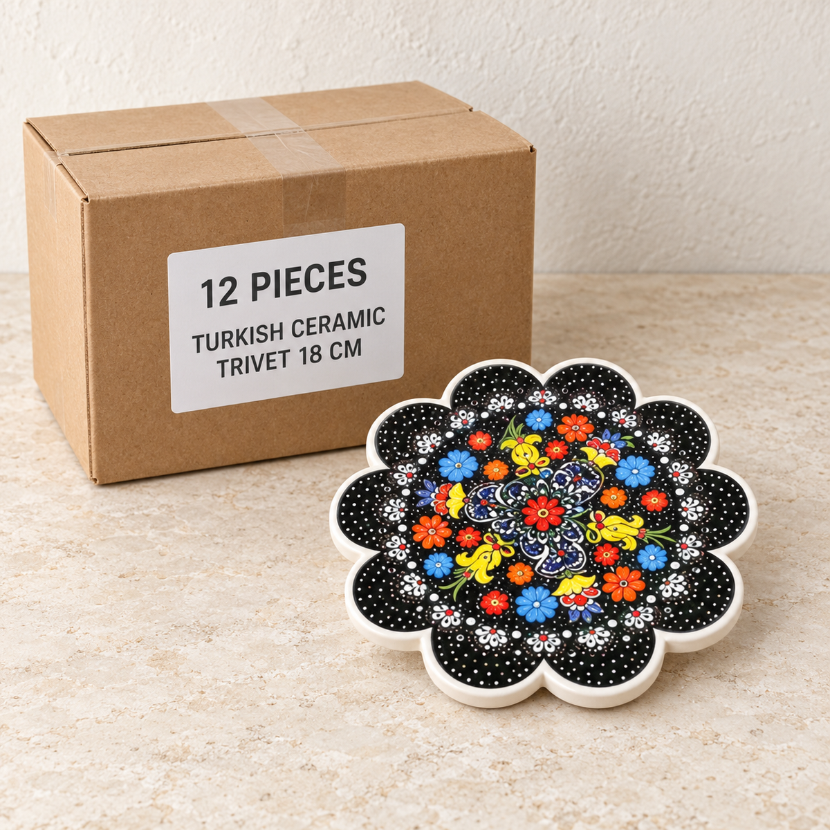 Turkish Ceramic Trivet - 18 cm — Box of 12 — 12 × Turkish Ceramic Trivet - 18 cm. Representative samples beside illustrative wholesale carton.