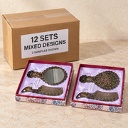 Decorative Mirror & Comb Sets — Box of 12 — Mixed box — 4 of each design. Representative samples beside illustrative wholesale carton.