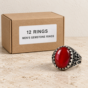 Rings — Box of 12 — 12 × Men's Gemstone Rings. Representative samples beside illustrative wholesale carton.