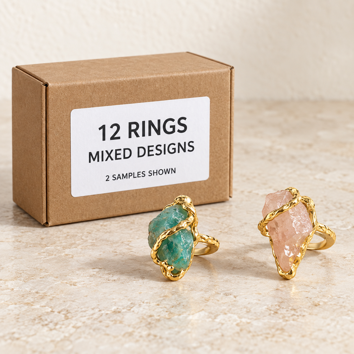 Rings — Box of 12 — Mixed box — 12 pieces (see contents). Representative samples beside illustrative wholesale carton.