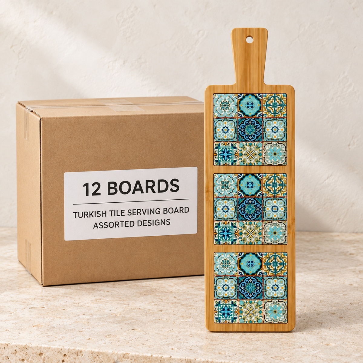 Turkish Tile Serving Boards — Box of 12 — 12 × Turkish Tile Serving Board - Assorted Designs. Representative samples beside illustrative wholesale carton.
