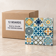 Turkish Tile Serving Boards — Box of 12 — 12 × Blue & Yellow Tile Serving Board. Representative samples beside illustrative wholesale carton.